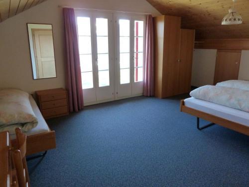 Chambre Quadruple avec Salle de Bains Privative